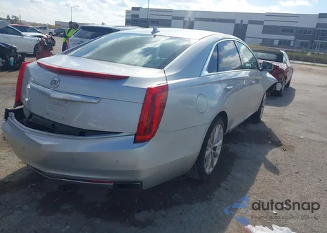 2014 Cadillac Xts Luxury from USA, damaged, VIN 2G61M5S32E9244777